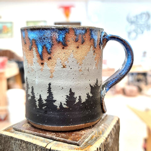 Layered Forest Tree Line with Blue